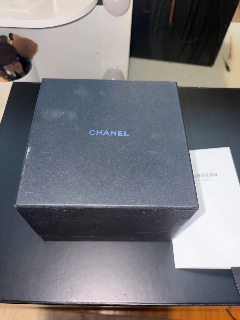 CHANEL Black Ceramic Ladies Watch with Silver Accents